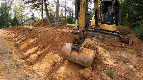 mini excavator drainage ditch